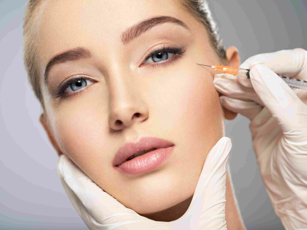 A Woman getting Injection in cheeks | Botox Burke, VA | Aesthetic Artistry