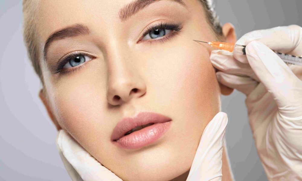 A Woman getting Injection in cheeks | Botox Burke, VA | Aesthetic Artistry